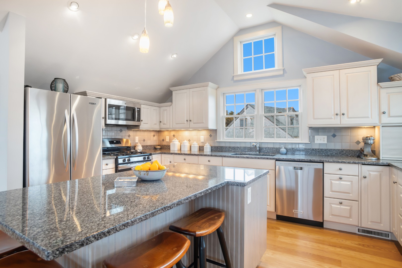 5 Tautemo Way Nantucket, MA 02554 - Photo 16 of 30 a kitchen with stainless steel appliances granite countertop a sink refrigerator and microwave