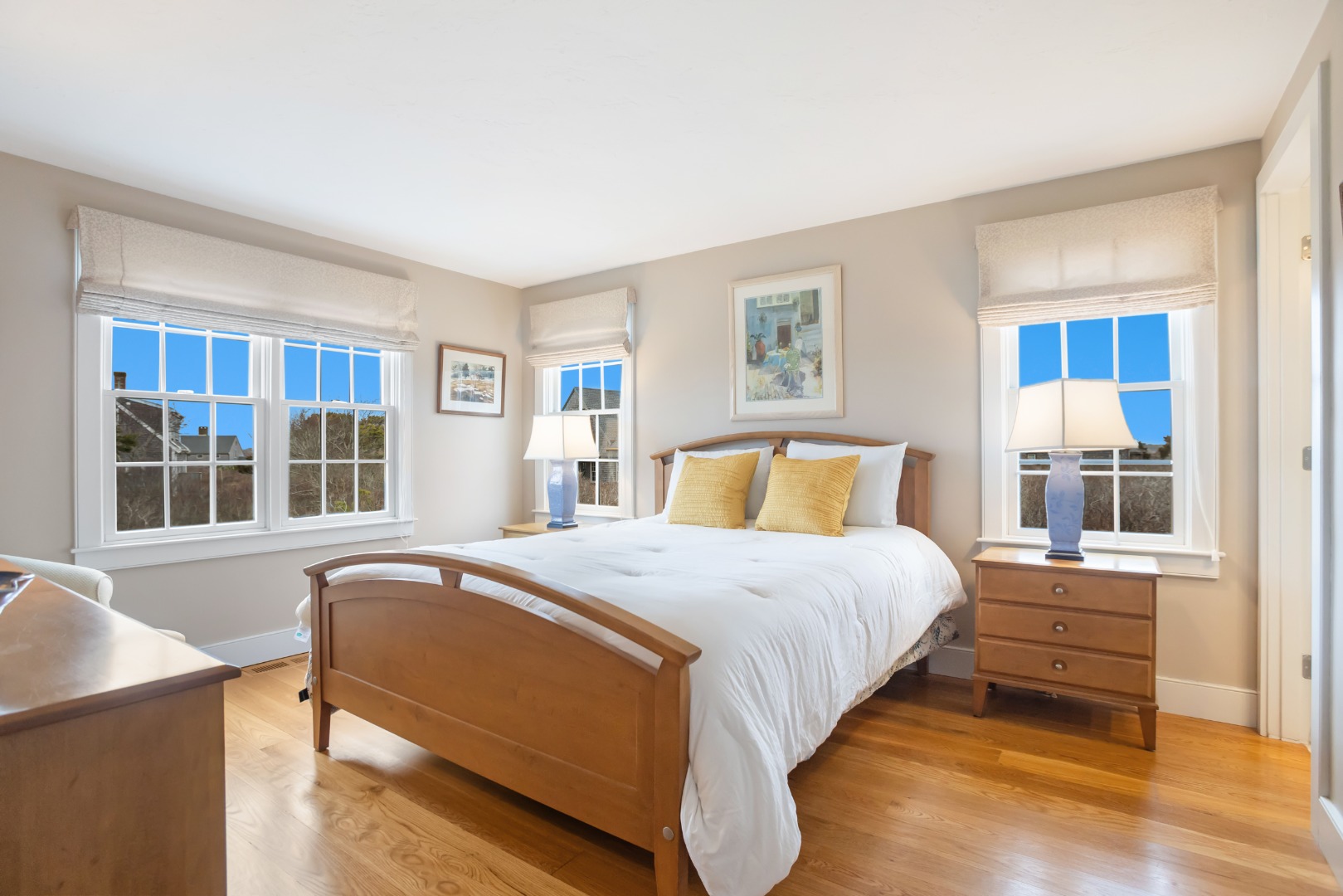 5 Tautemo Way Nantucket, MA 02554 - Photo 19 of 30 a bedroom with a bed and a large window