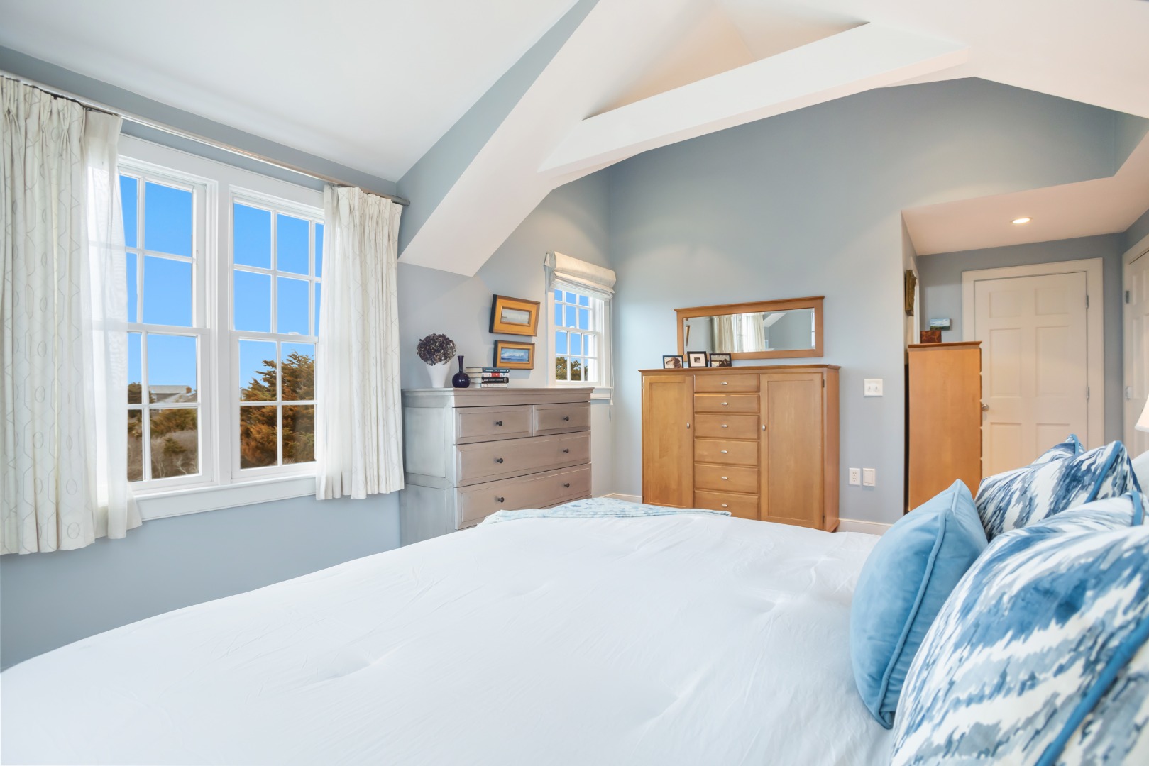 5 Tautemo Way Nantucket, MA 02554 - Photo 21 of 30 a bedroom with a large bed and a dresser