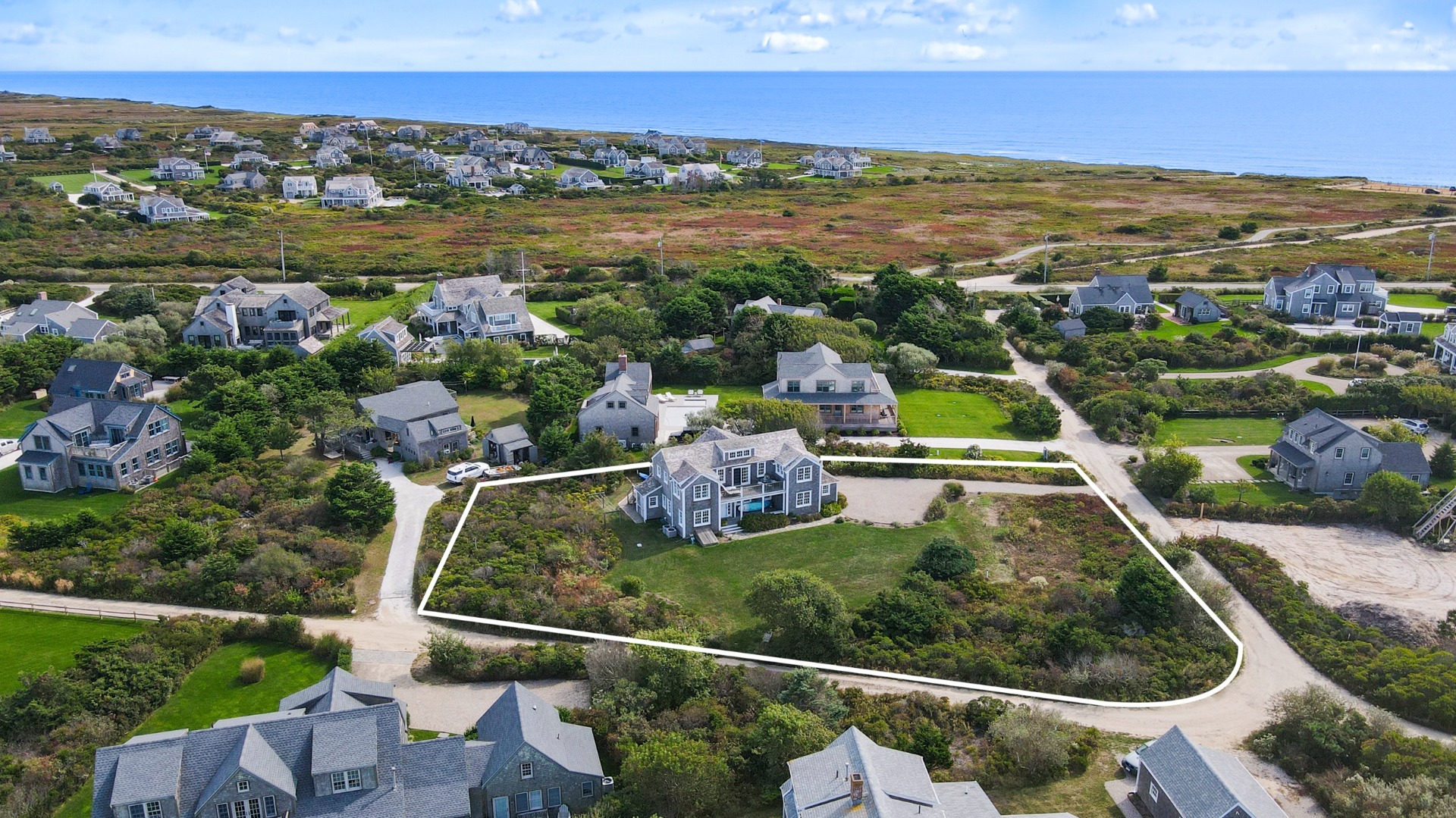 5 Tautemo Way Nantucket, MA 02554 - Photo 6 of 30 a view of a city with an ocean view