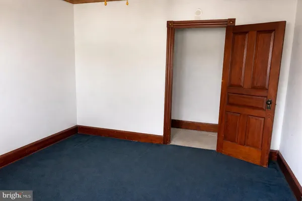 an empty room with closet