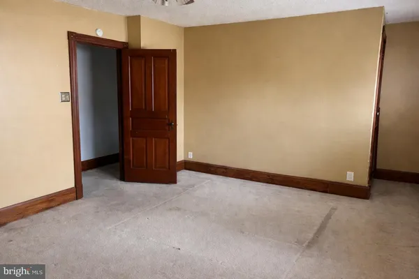 an empty room with closet