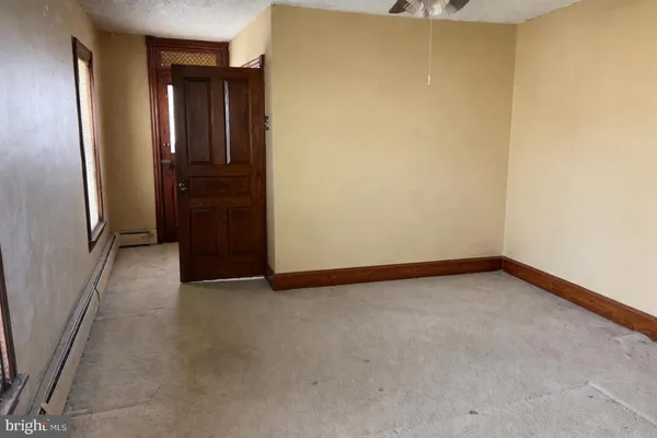 an empty room with closet