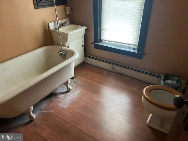 a bathroom with a sink and a bathtub