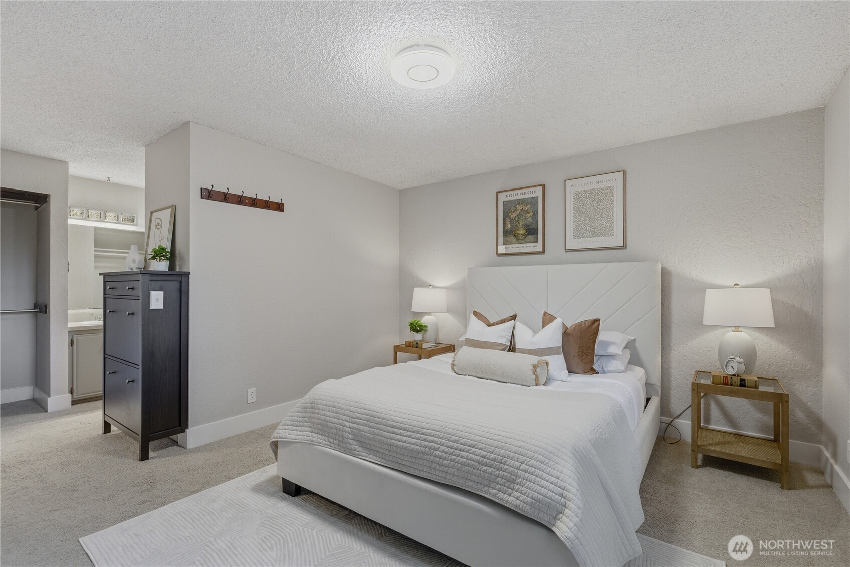 13011 Seattle Hill Road Snohomish, WA 98296 - Photo 13 of 40 a bedroom with a bed and a lamp