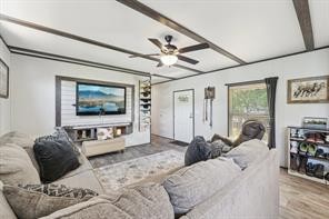 21472 Coyote Trail Lago Vista, TX 78645 - Photo 5 of 11 a living room with furniture and a flat screen tv