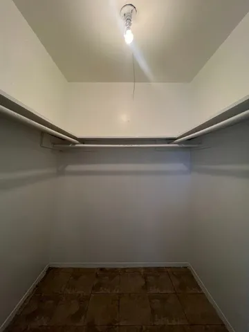 a view of a room with racks on the wall