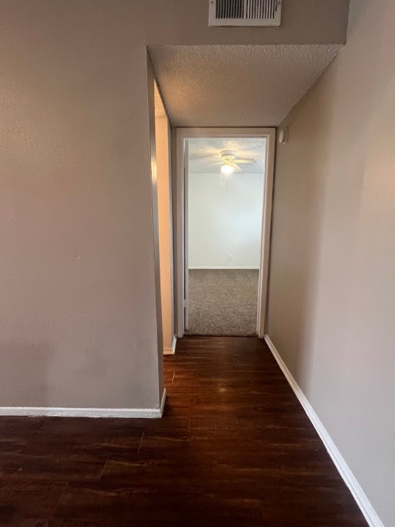 311 East 31st Street, Unit 205 Austin, TX 78705 - Photo 6 of 17 a view of a hallway with wooden floor