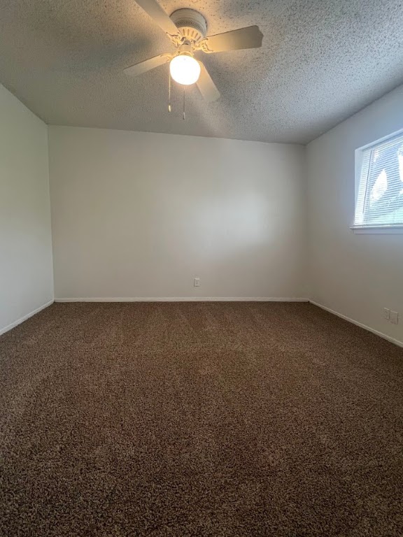 311 East 31st Street, Unit 205 Austin, TX 78705 - Photo 8 of 17 an empty room with a empty space and a window