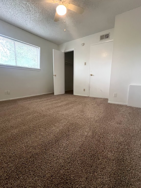 311 East 31st Street, Unit 205 Austin, TX 78705 - Photo 9 of 17 an empty room with windows