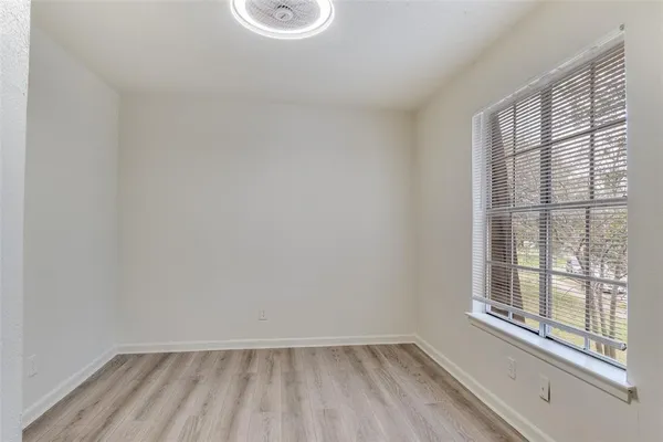 a view of a small space with a window