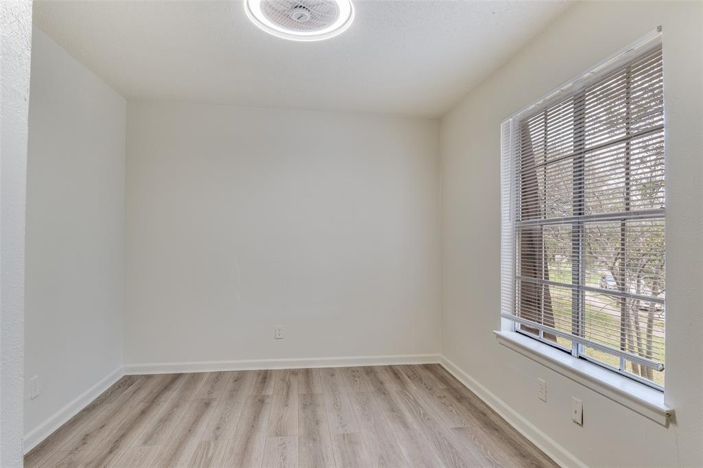 11348 McCree Road Dallas, TX 75238 - Photo 10 of 15 a view of a small space with a window