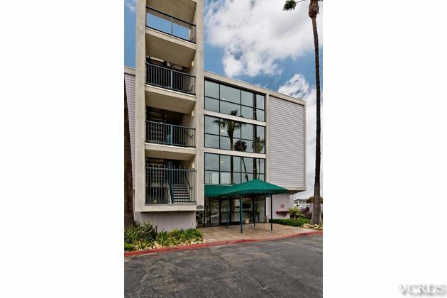 2901 Peninsula Road, Unit 150 Oxnard, CA 93035 - Photo 12 of 24 a front view of a building with sitting area