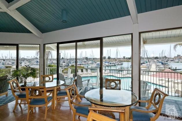2901 Peninsula Road, Unit 150 Oxnard, CA 93035 - Photo 15 of 24 a dining room with furniture window and outside view