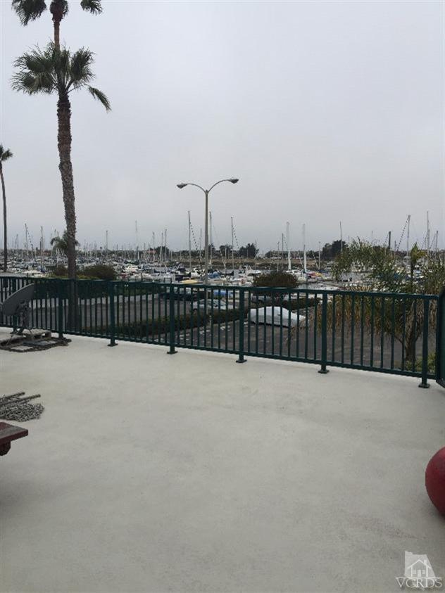 2901 Peninsula Road, Unit 150 Oxnard, CA 93035 - Photo 3 of 24 a view of terrace with wooden fence