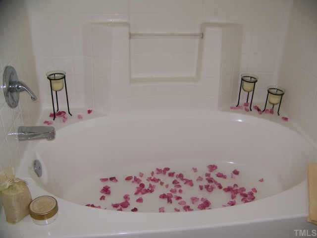 7117 Missionary Ridge Drive Raleigh, NC 27610 - Photo 6 of 12 PAMPER YOURSELF! In the grand master wing! Escape to the spa! Comfort for a weary King & Queen! Unwind with a long soak in the tub or an exhilarating shower! So nice to come home to! Other