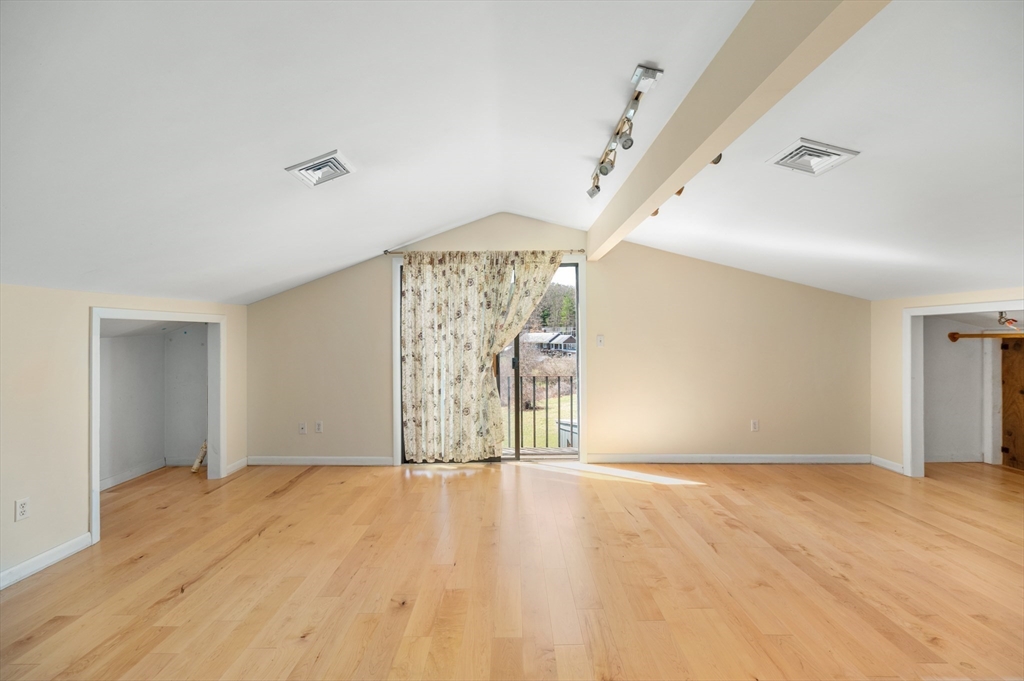 37 East Street Topsfield, MA 01983 - Photo 30 of 39 a view of empty room with wooden floor