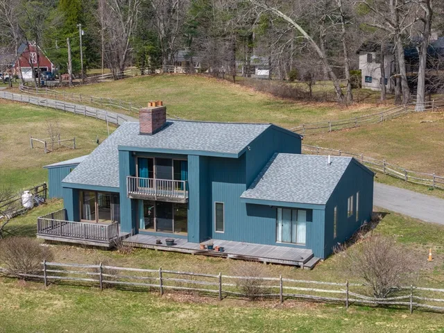 a front view of a house with swimming pool