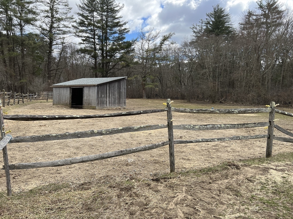 37 East Street Topsfield, MA 01983 - Photo 7 of 39 a view of a house with a yard
