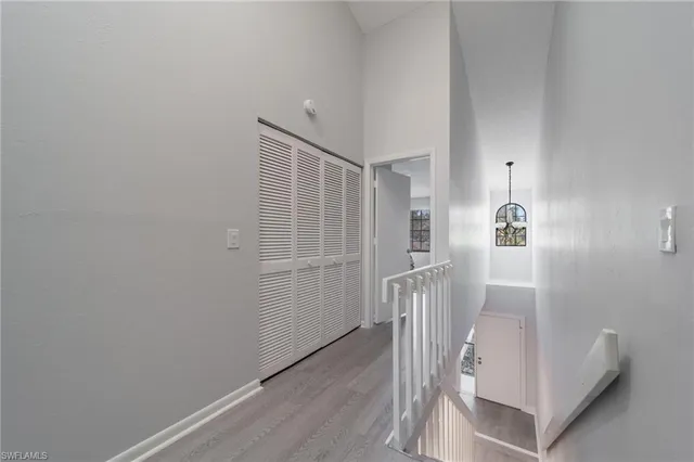 a view of entryway with wooden floor