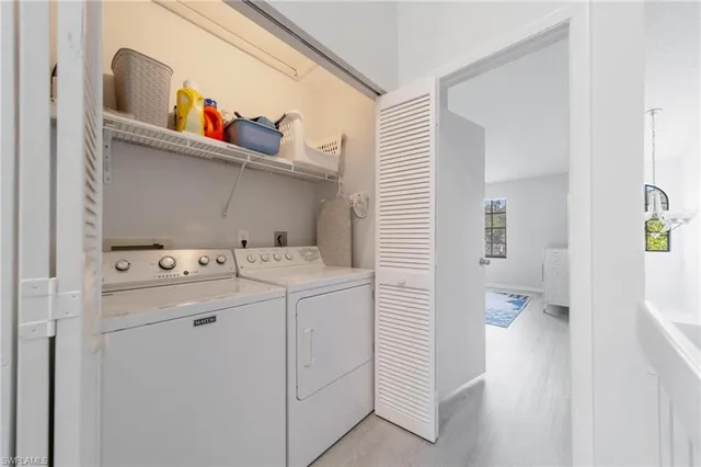 a utility room with dryer and washer