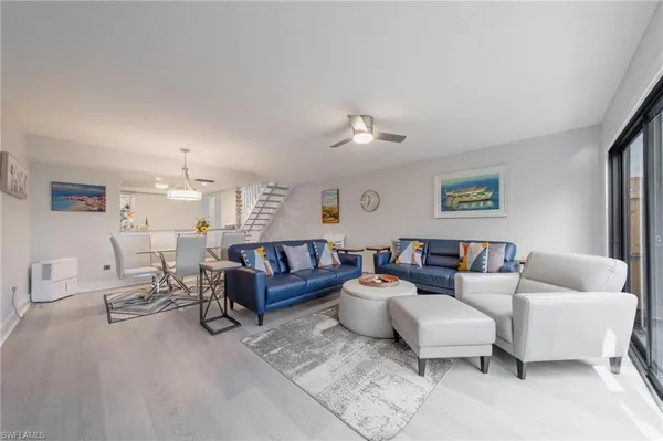 a living room with furniture and a couch