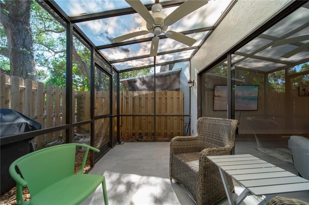 820 Meadowland Drive, Unit D Naples, FL 34108 - Photo 23 of 30 a view of a patio in the backyard