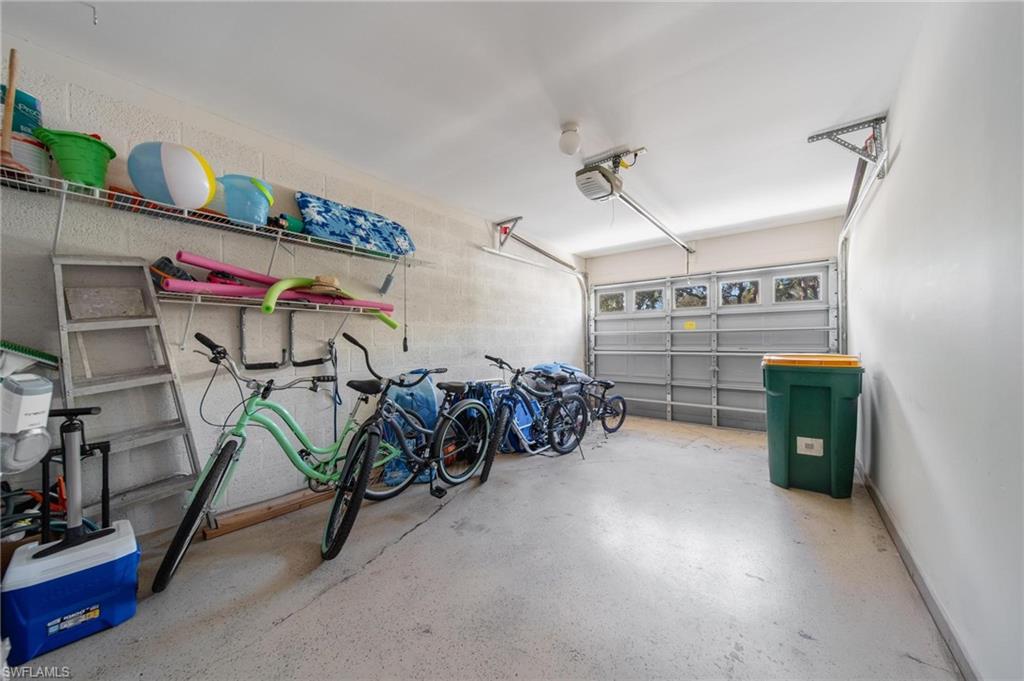 820 Meadowland Drive, Unit D Naples, FL 34108 - Photo 24 of 30 a view of a room with gym equipment