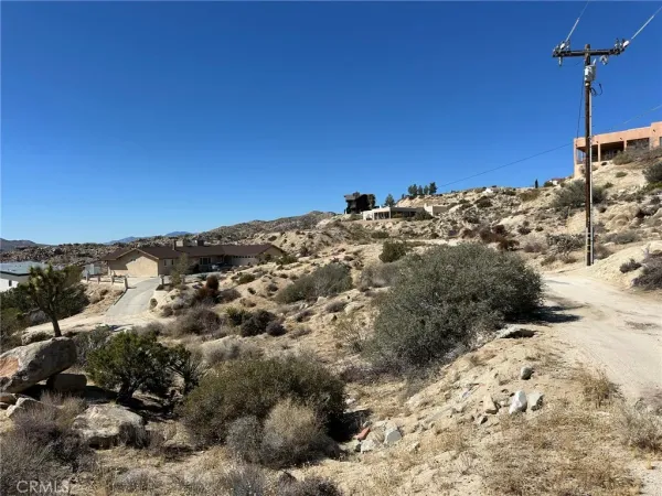 a view of a lake with mountains in the background