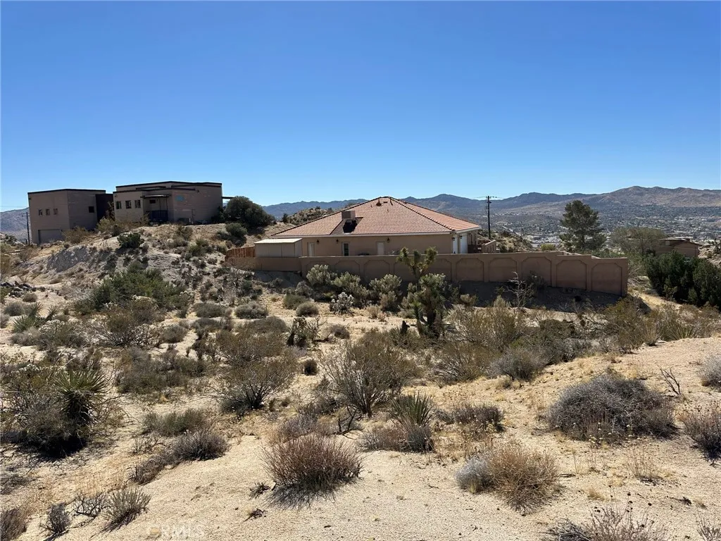2 Buena Suerte Road Rancho Santa Margarita, CA 92688 - Photo 10 of 10 a view of a houses with a yard