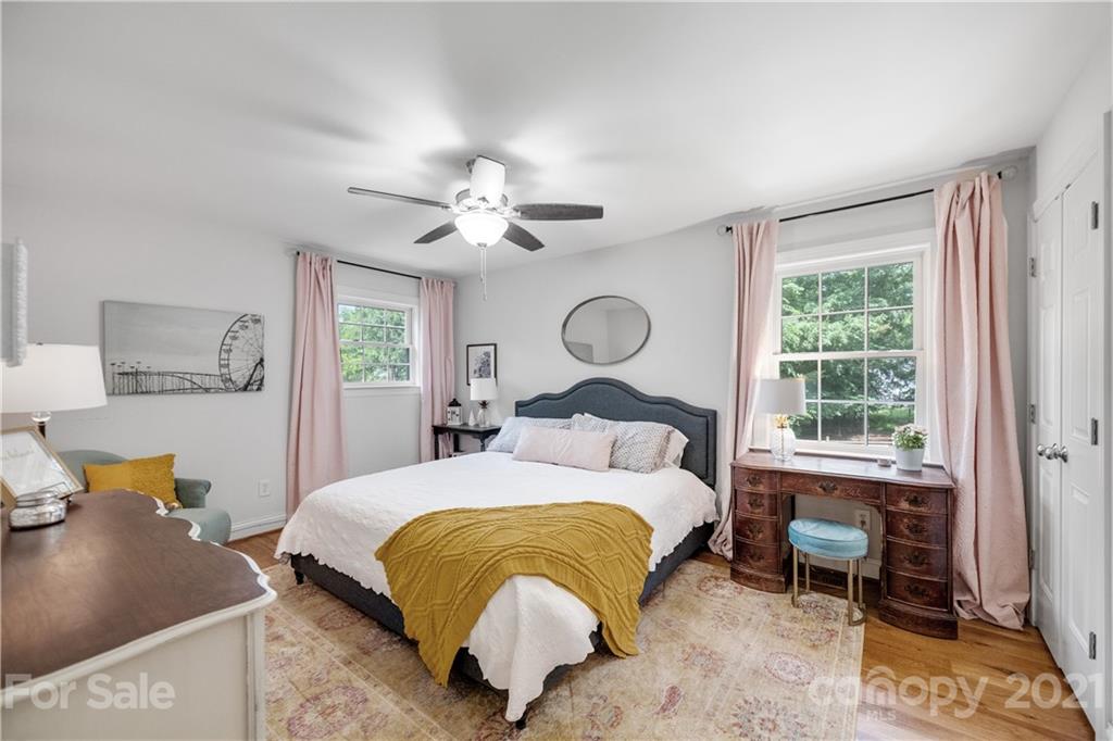 7324 Windyrush Road Charlotte, NC 28226 - Photo 12 of 27 a bedroom with a bed and a window