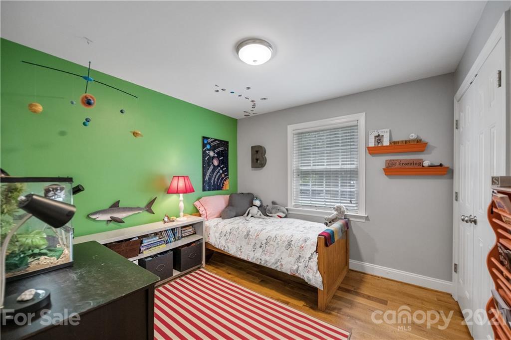 7324 Windyrush Road Charlotte, NC 28226 - Photo 14 of 27 a bedroom with a bed and a window