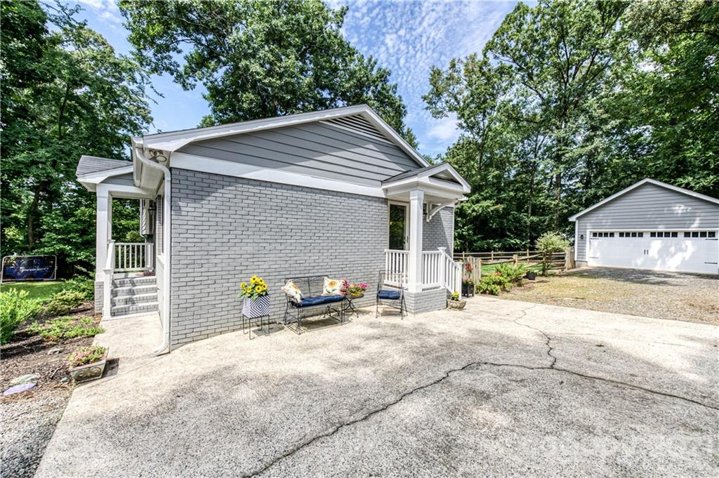 7324 Windyrush Road Charlotte, NC 28226 - Photo 20 of 27 a view of a house with patio