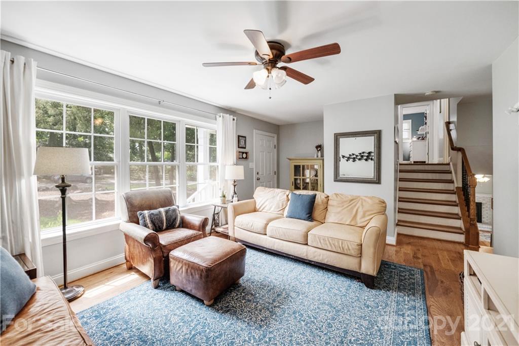 7324 Windyrush Road Charlotte, NC 28226 - Photo 3 of 27 a living room with furniture and a large window