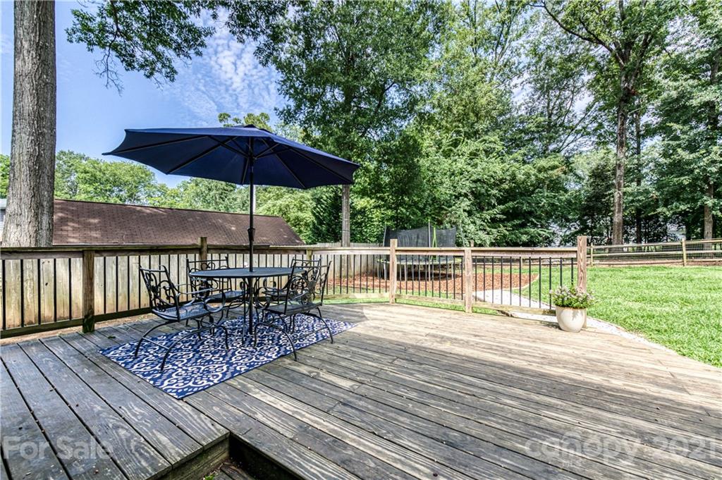 7324 Windyrush Road Charlotte, NC 28226 - Photo 22 of 27 a view of roof deck with furniture