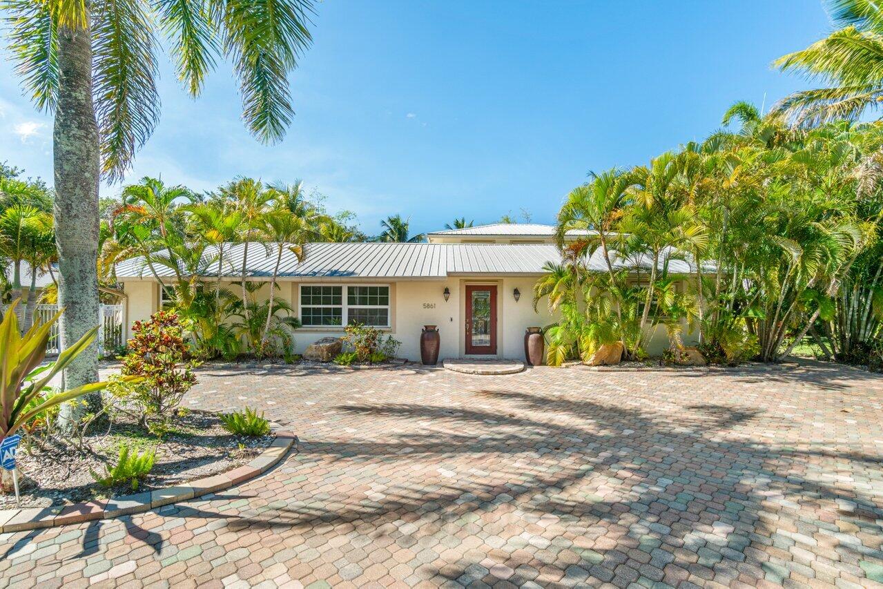 5861 Roebuck Road Jupiter, FL 33458 - Photo 58 of 74 Front of House