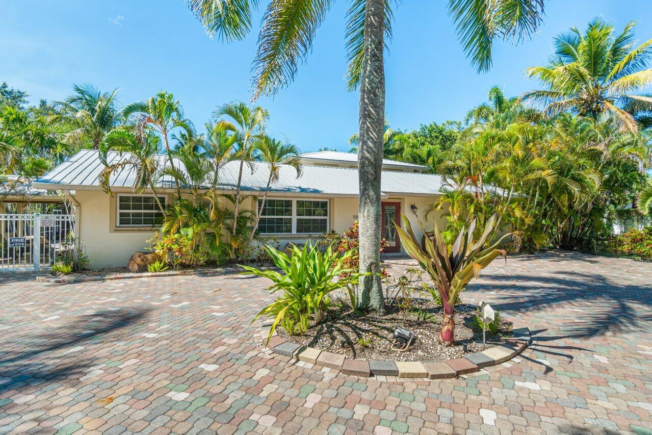 5861 Roebuck Road Jupiter, FL 33458 - Photo 59 of 74 Front of House