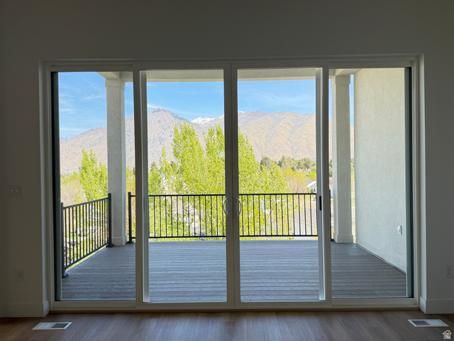 624 North Legend Circle, Unit 480 Mapleton, UT 84664 - Photo 32 of 34 Doorway to outside featuring a mountain view and wood finished floors