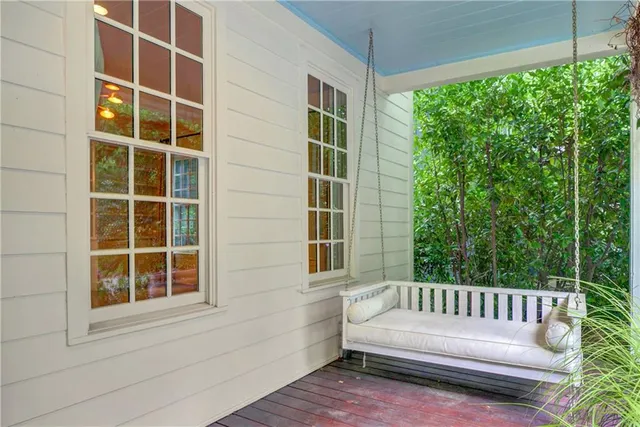 a view of a balcony with a chair