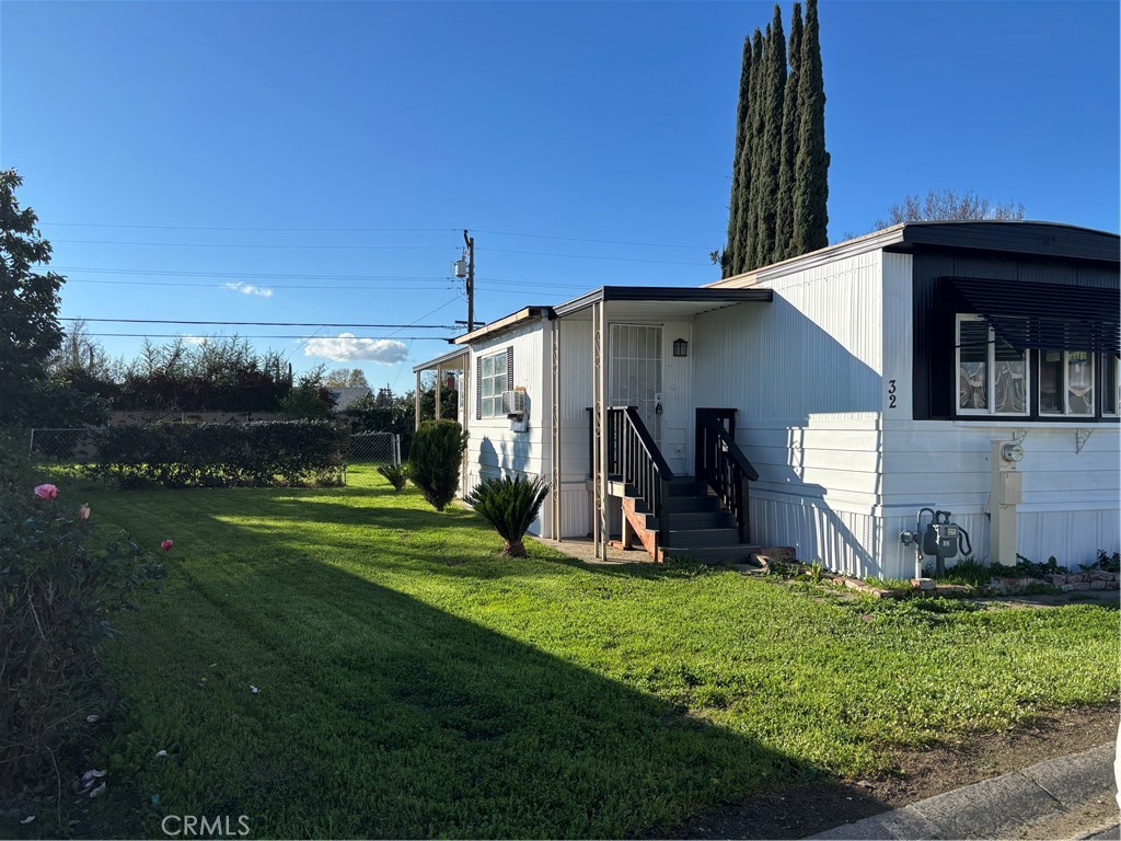 2499 East Gerard Avenue, Unit 32 Merced, CA 95341 - Photo 7 of 7 a view of a house with backyard and porch