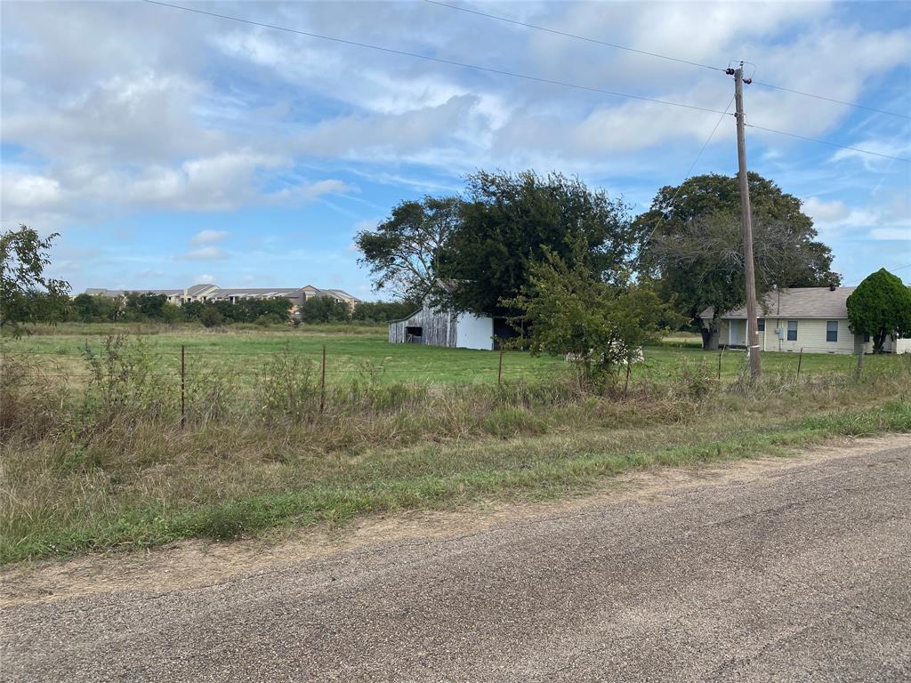 718 Ender Road Waco, TX 76706 - Photo 16 of 27 a view of a lake with a big yard and palm trees