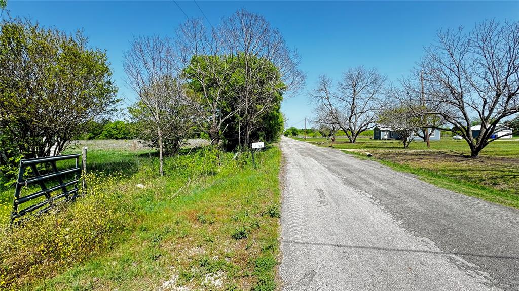 718 Ender Road Waco, TX 76706 - Photo 25 of 27 a view of a garden with a tree