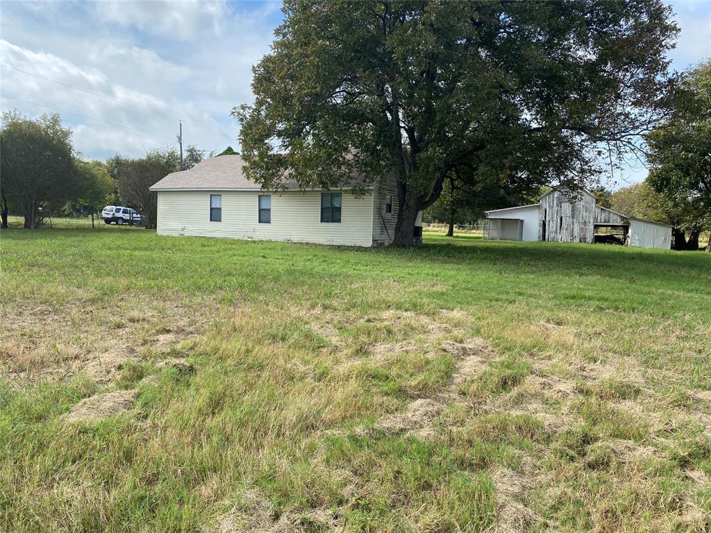 718 Ender Road Waco, TX 76706 - Photo 3 of 27 a view of a house with a yard