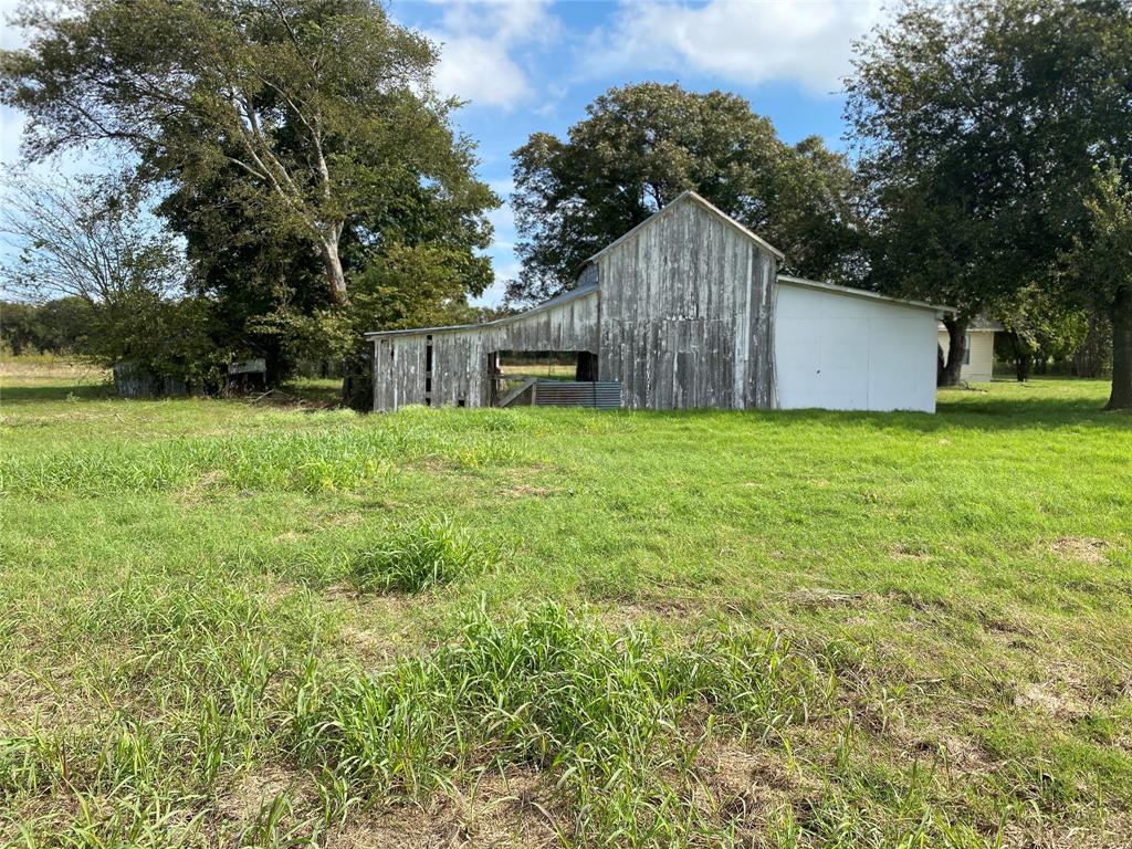 718 Ender Road Waco, TX 76706 - Photo 7 of 27 a house with a tree in front of it