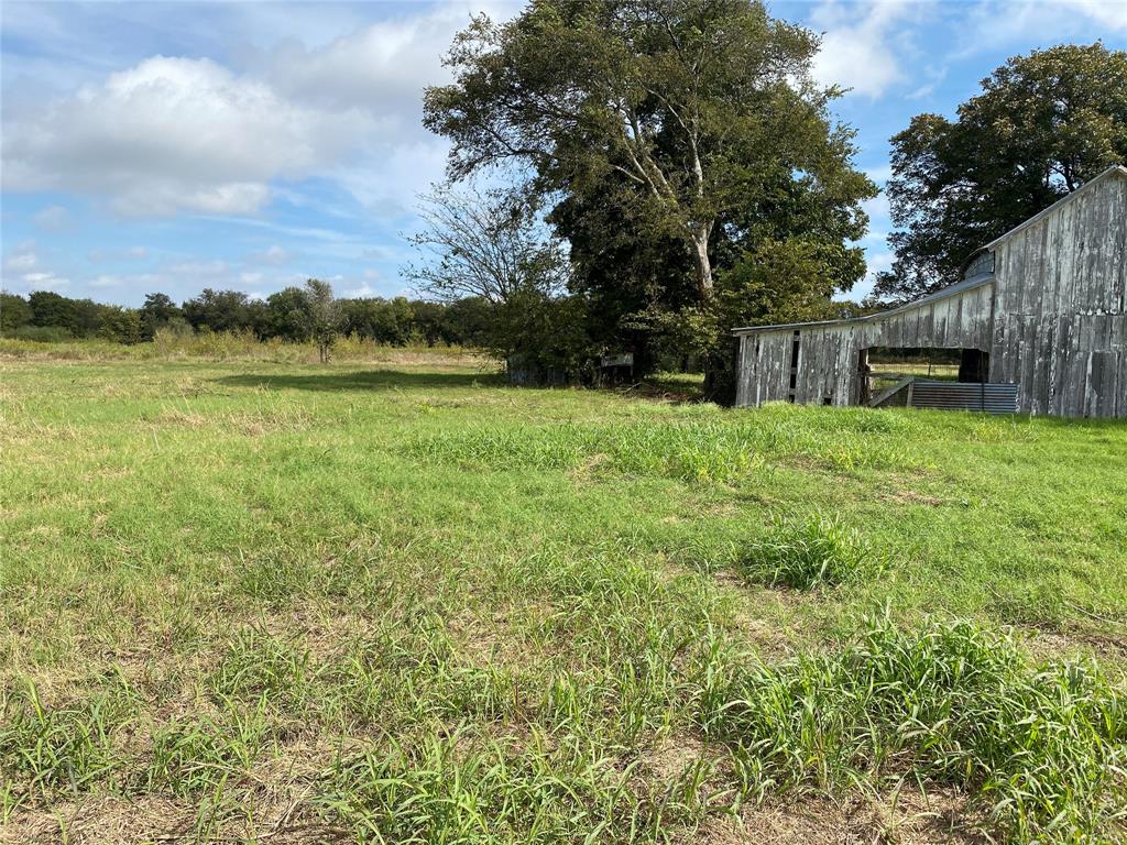 718 Ender Road Waco, TX 76706 - Photo 8 of 27 a backyard of a house with lots of green space