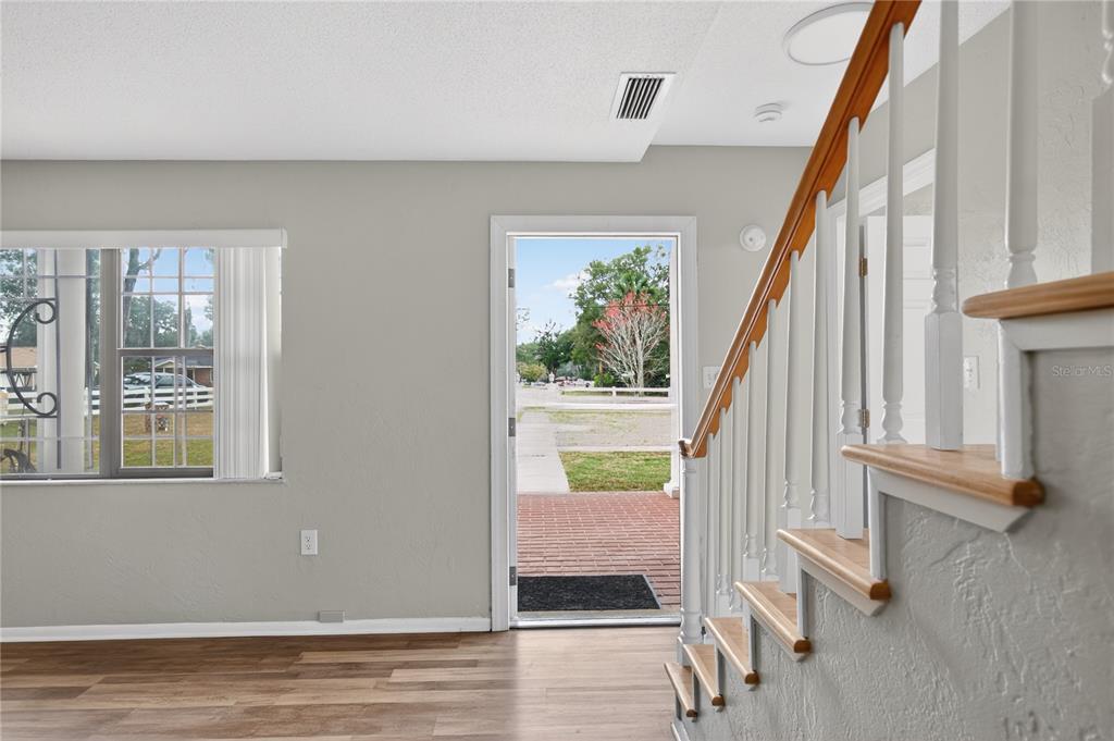 11 Reyes Road DeLand, FL 32724 - Photo 11 of 37 a view of an entryway with staircase