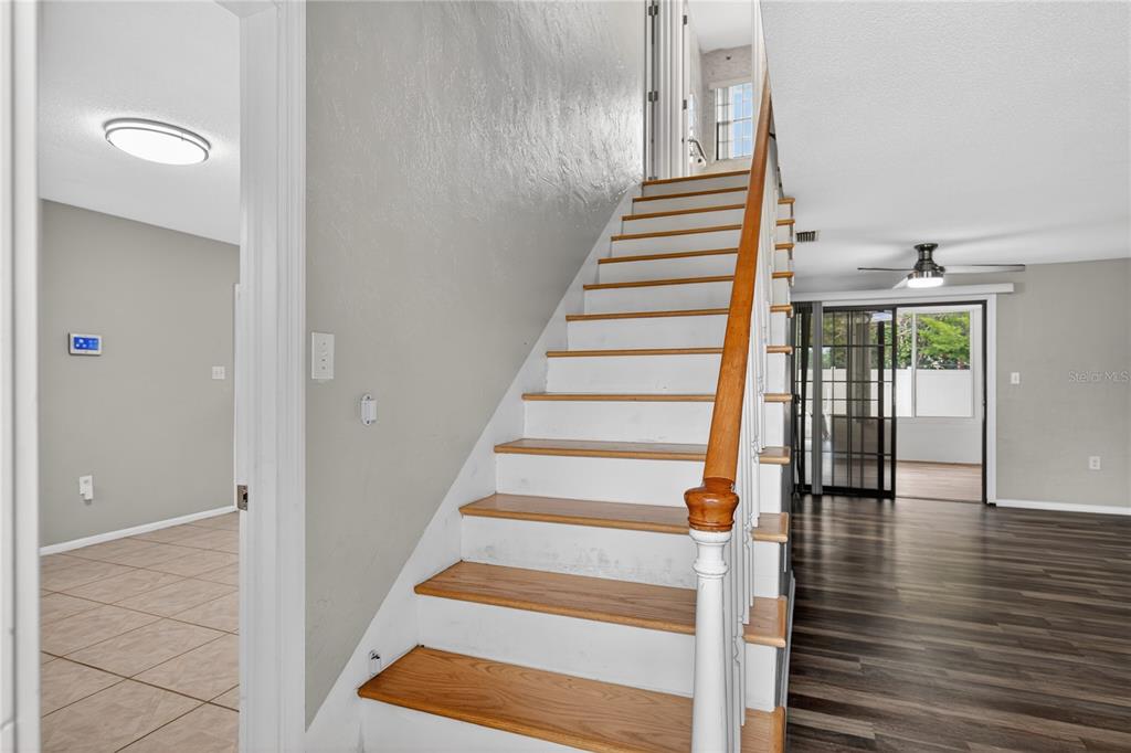 11 Reyes Road DeLand, FL 32724 - Photo 20 of 37 a view of entryway and hall with wooden floor