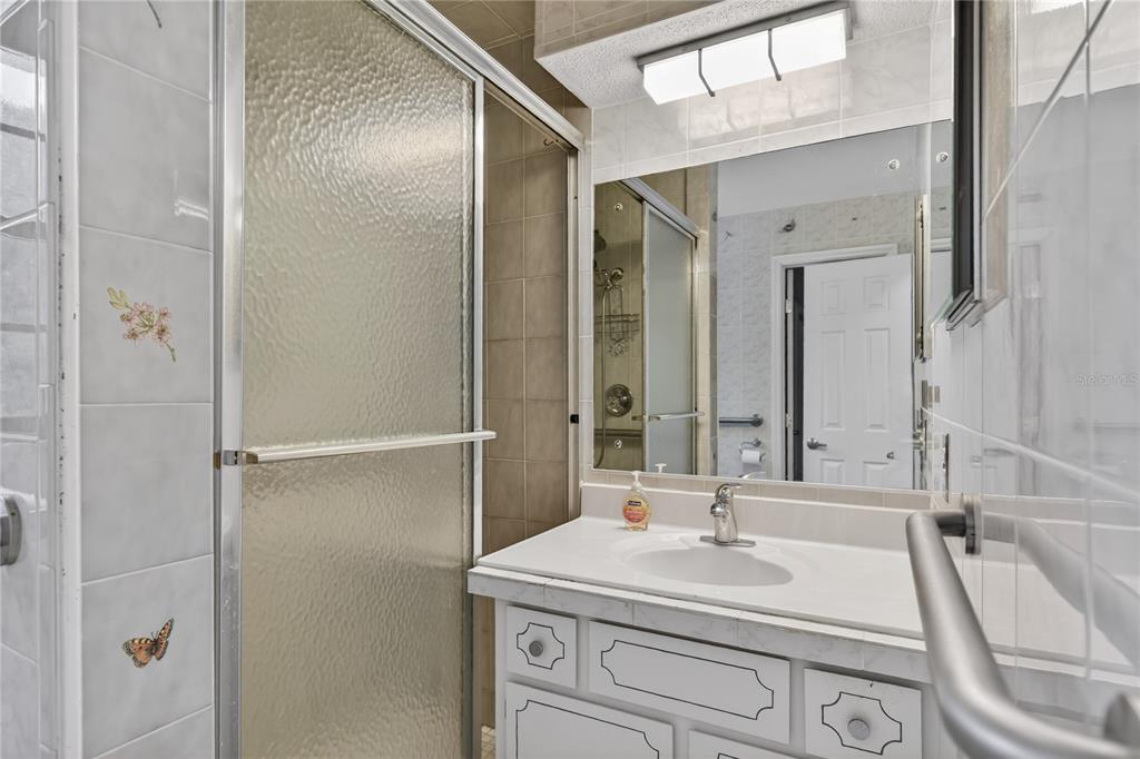11 Reyes Road DeLand, FL 32724 - Photo 24 of 37 a bathroom with a sink and a mirror