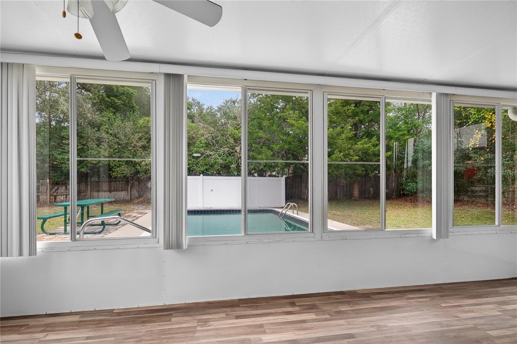 11 Reyes Road DeLand, FL 32724 - Photo 29 of 37 a view of a room with wooden floor and front door