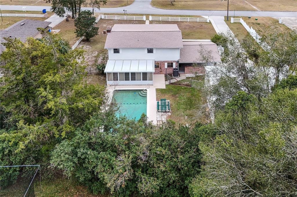 11 Reyes Road DeLand, FL 32724 - Photo 8 of 37 an aerial view of a house with a yard